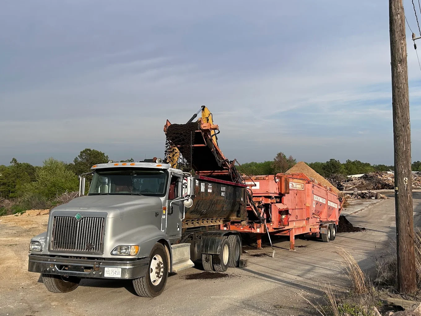 Superior Tree truck and chipper at a job site